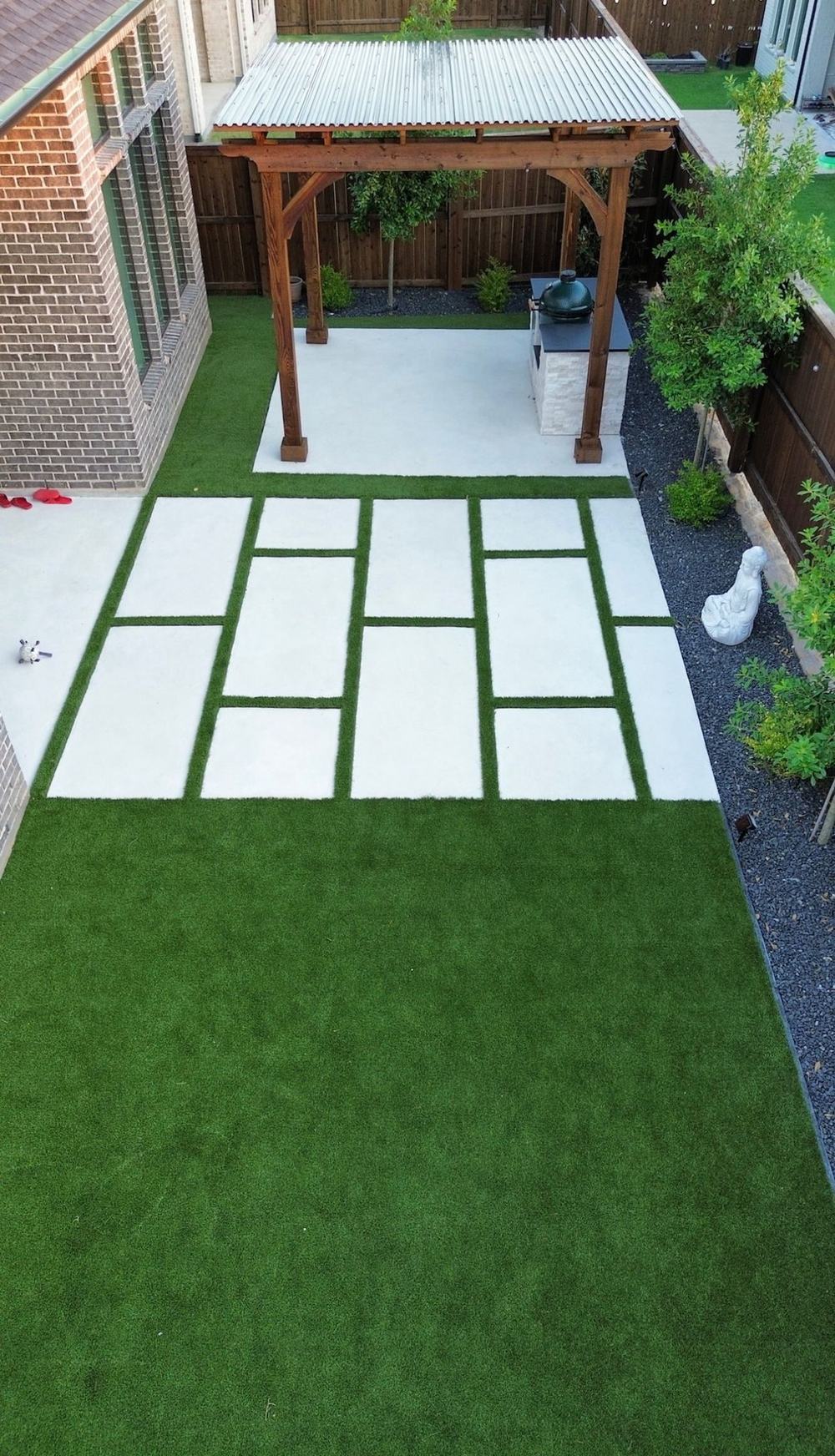 Cedar pergola with paver pad and turf